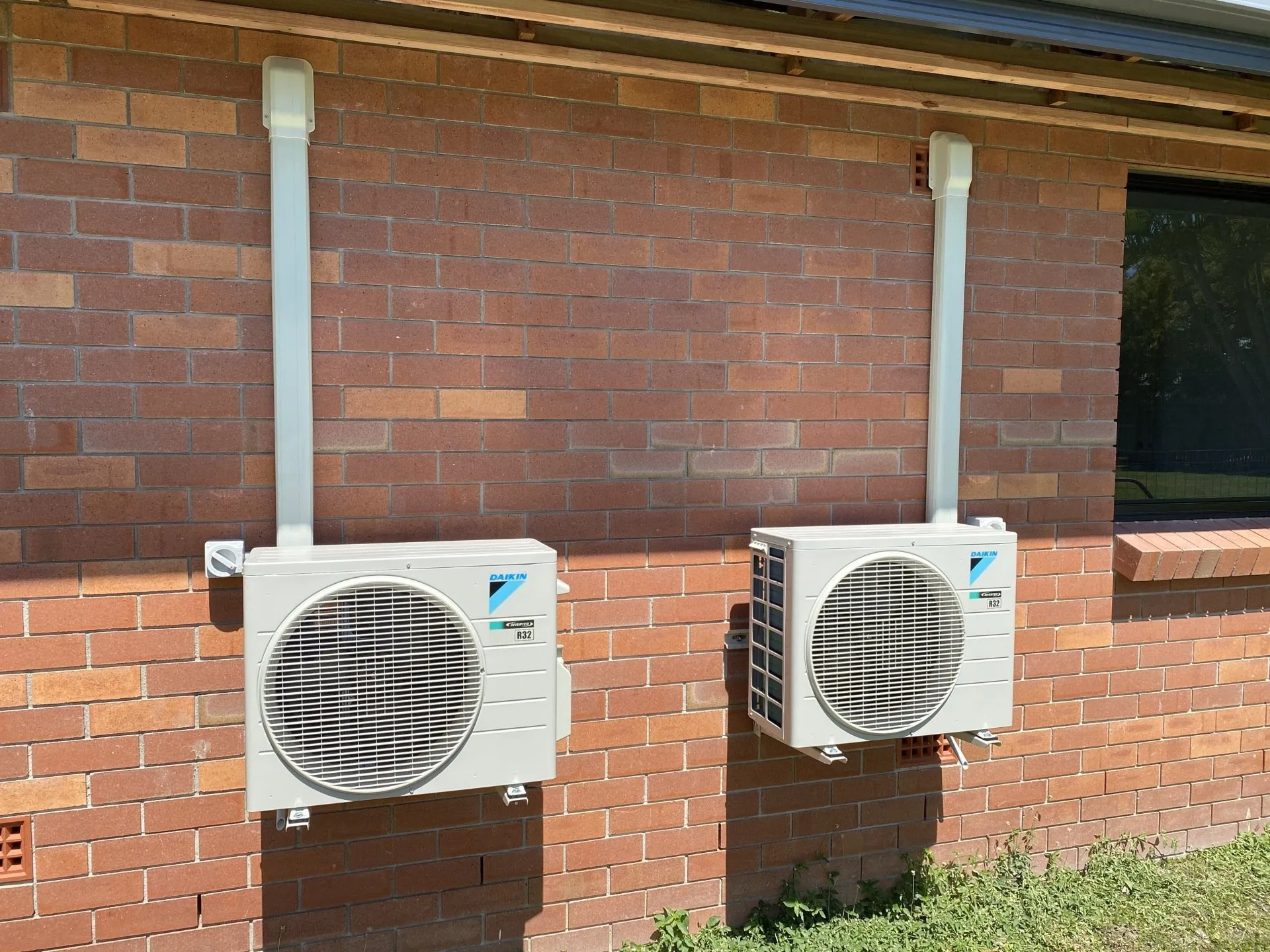 Daikin split-system air conditioner installed in a Townsville bedroom by On Point