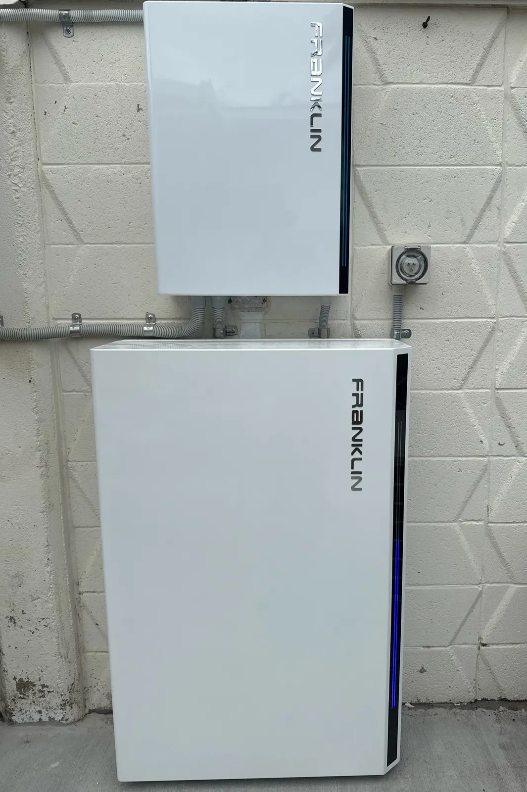 Two stacked FranklinWH aPower batteries installed by On Point Solar at a Townsville home