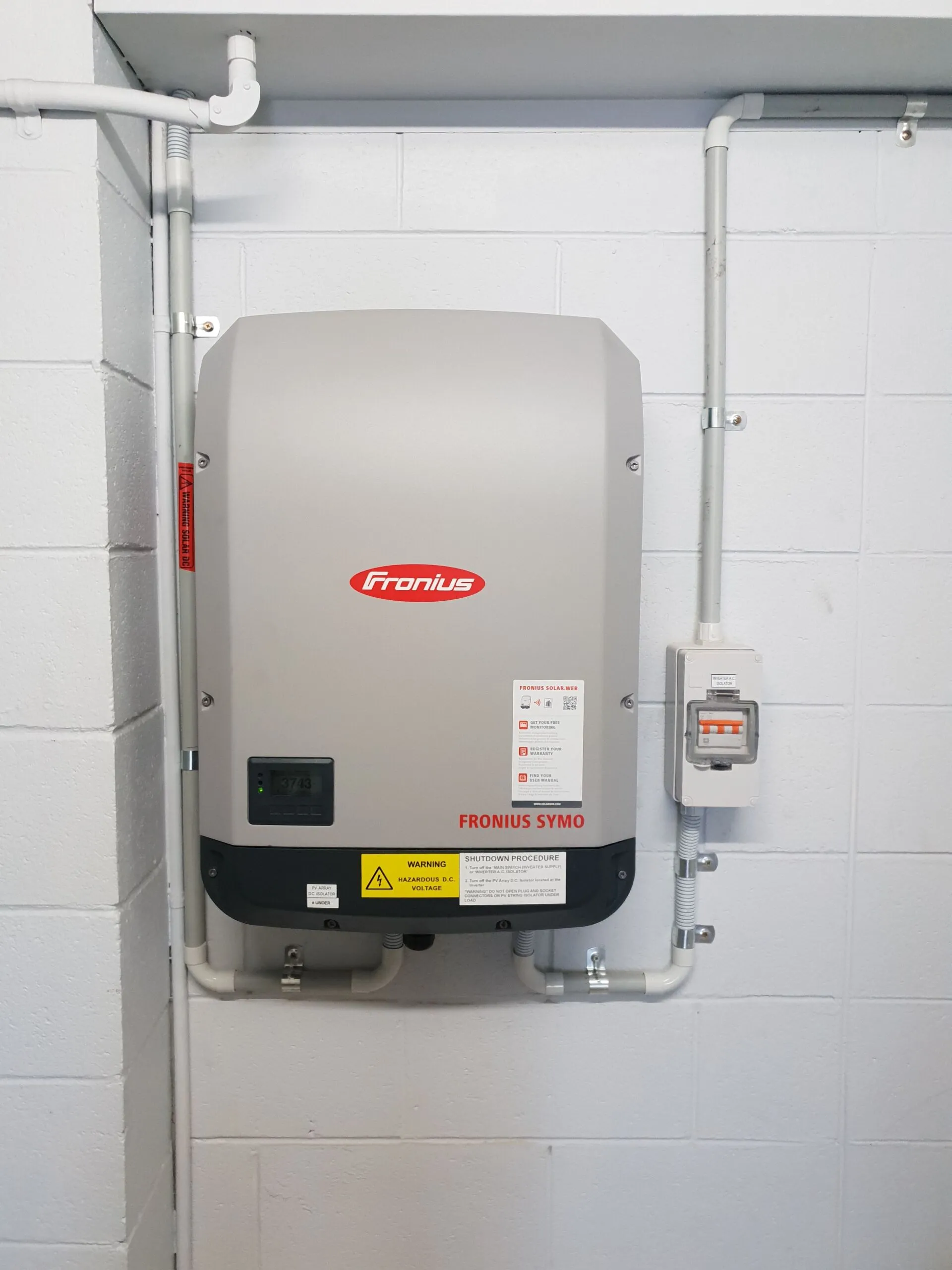 Fronius Symo solar inverter neatly installed and wired by On Point Solar in Townsville