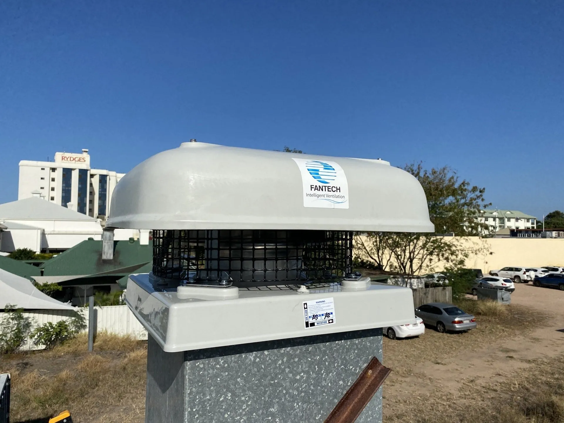 On Point Solar & Electrical rooftop work in Townsville under a clear North Queensland sky