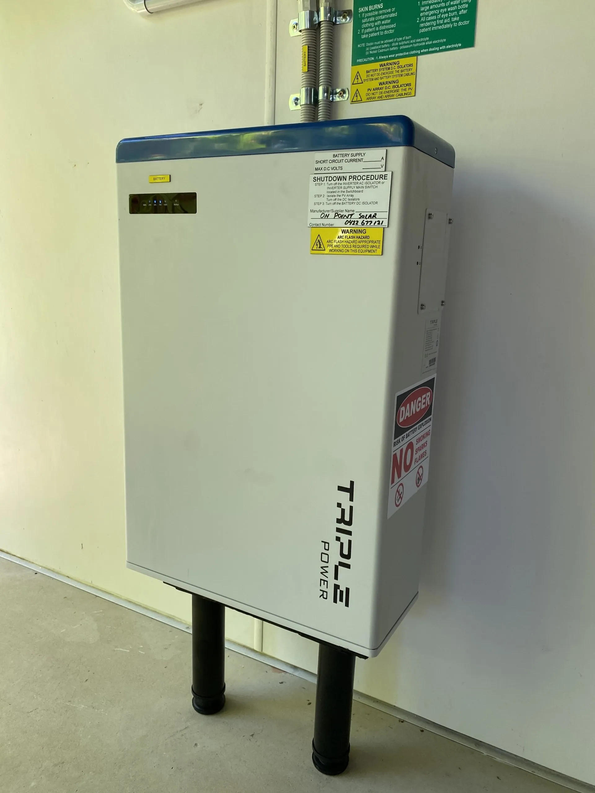 Home solar battery installed in a Townsville garage by On Point Solar & Electrical