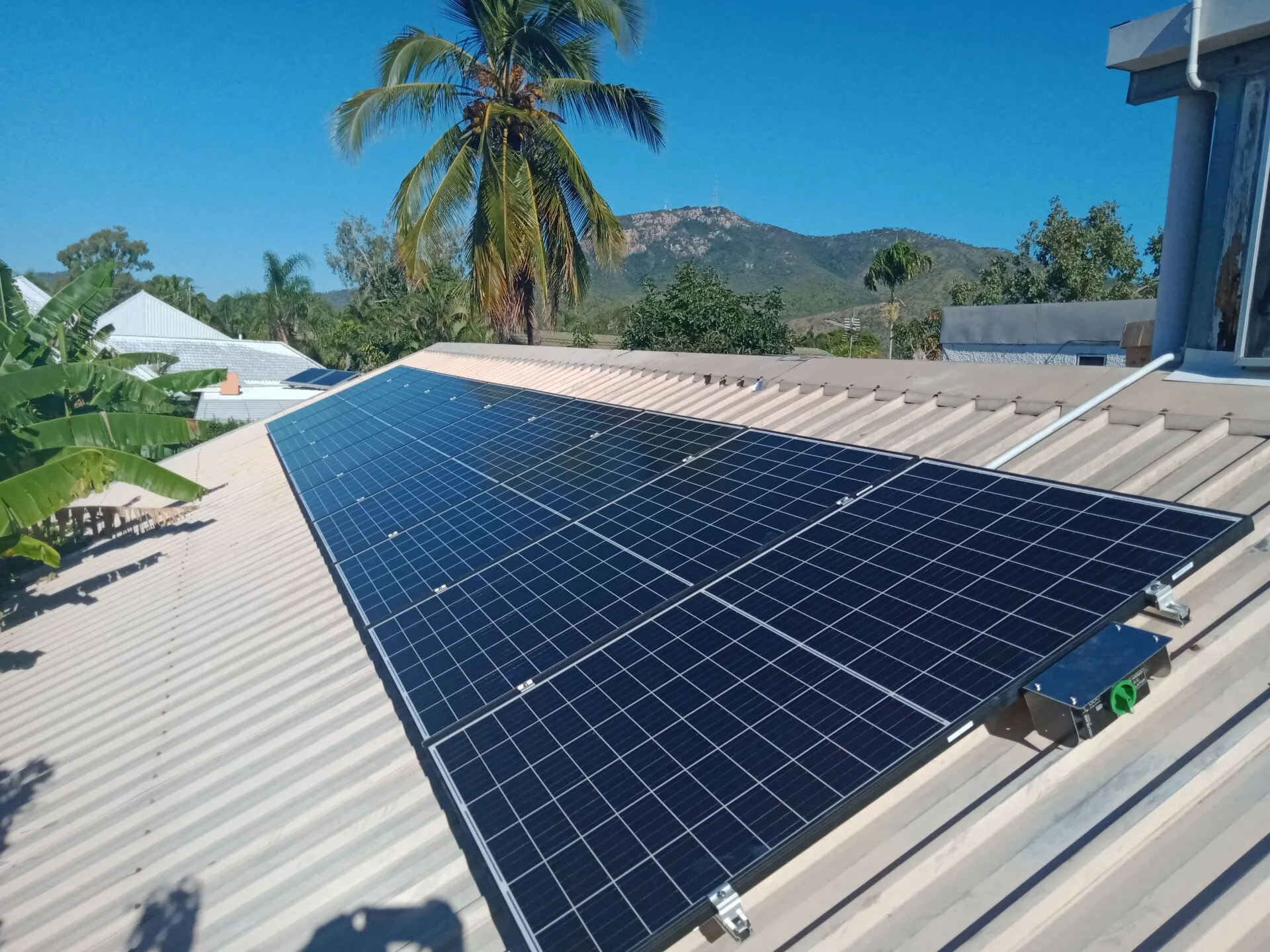 Cyclone-rated solar panels mounted on a tiled Townsville roof by On Point Solar